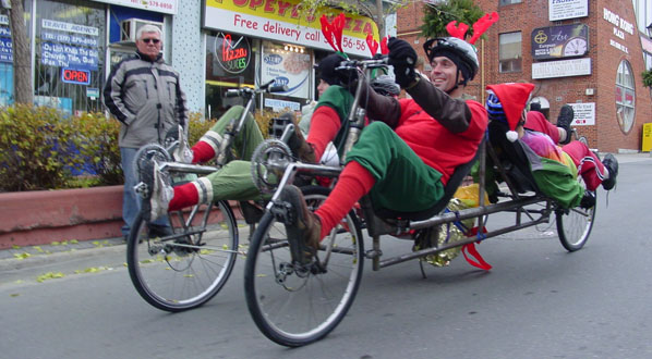 Carla and Dan pilot the Family Truckster in Santa Claus Parade