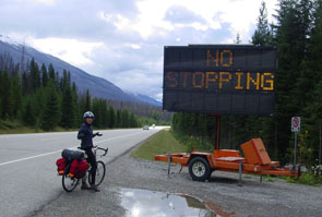 CAUTION WOLF ON HIGHWAY. NO STOPPING